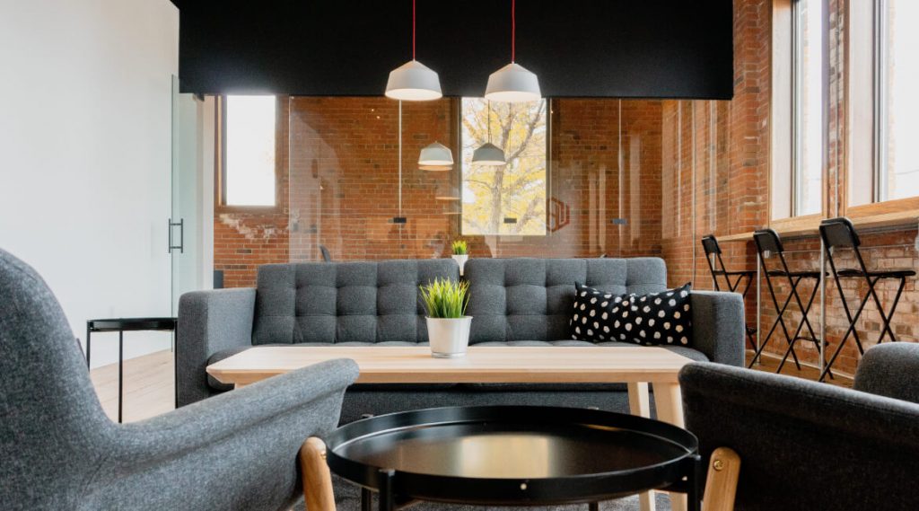 Living room with gray sofa and two armchairs